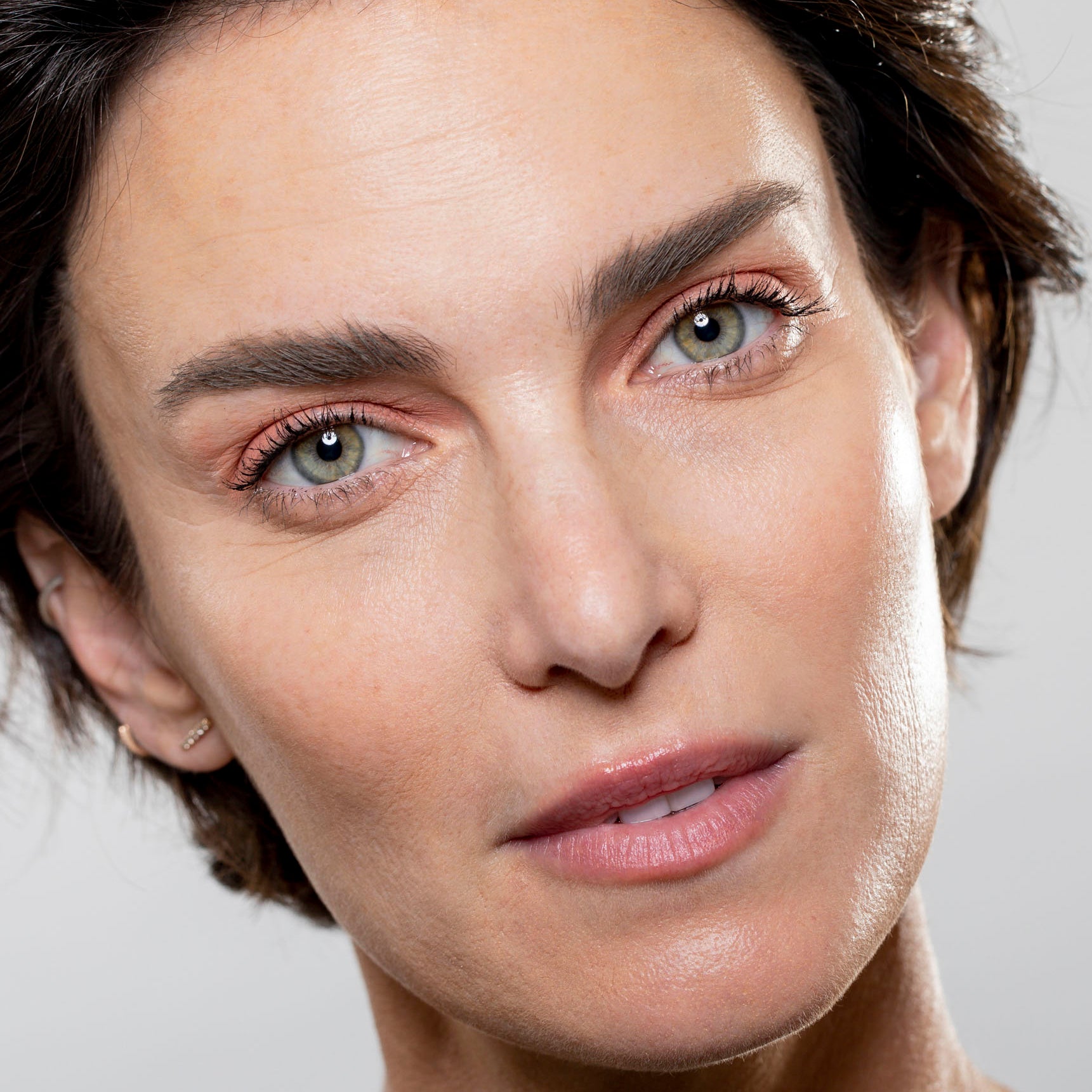 closeup of model's face wearing Arch Support Brow Powder Gel 